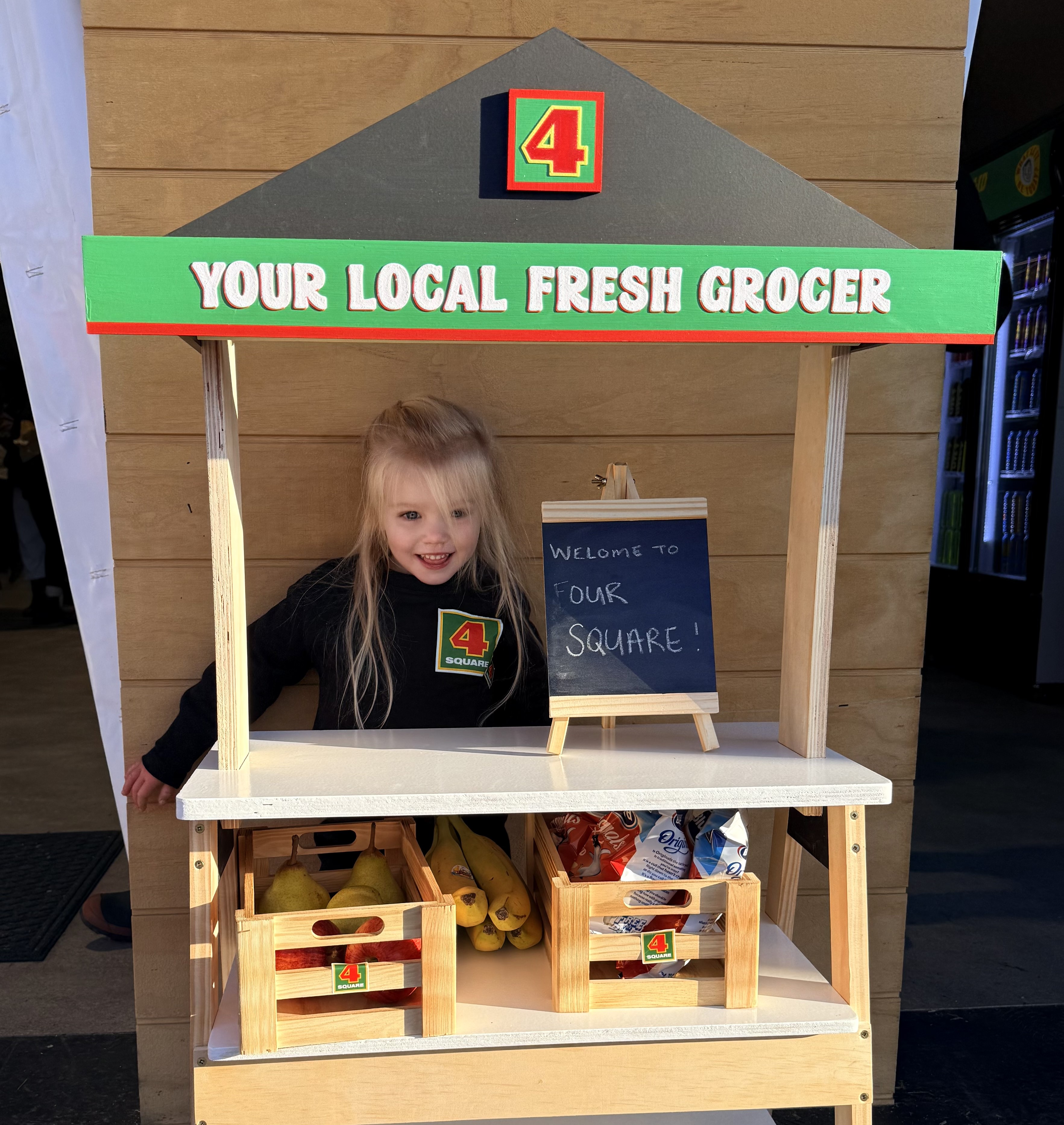 Lilah_ready_to_serve_her_customers_at_the_mini_Four_Square_store!.jpg