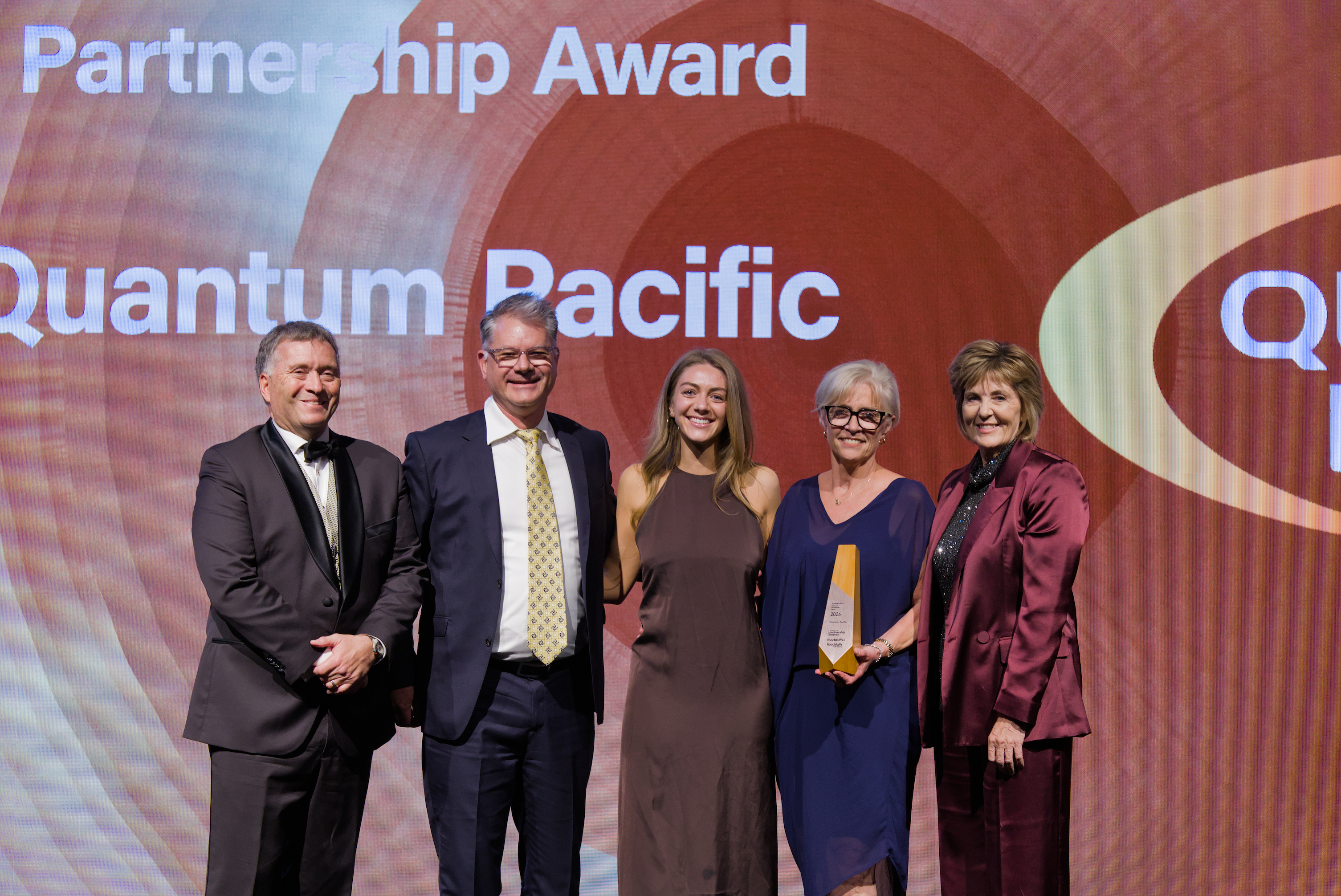 Chris Quin and Mary Devine with Barry Roberston, Georgia Robertson and Leanne Roberston from Quantum Pacific