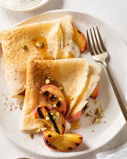 Crêpes with chargrilled peaches