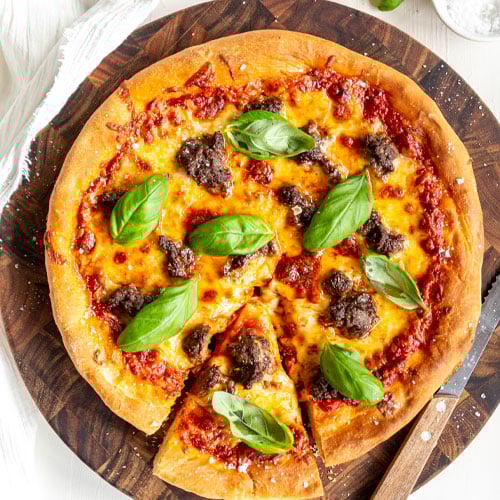 Deep pan pizza with beef sausage
