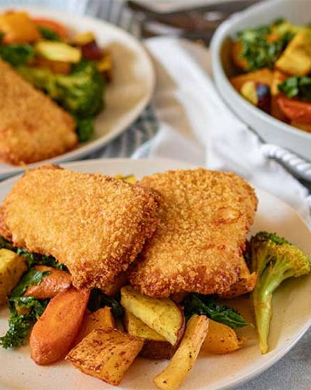 Crumbed fish with roasted vege salad