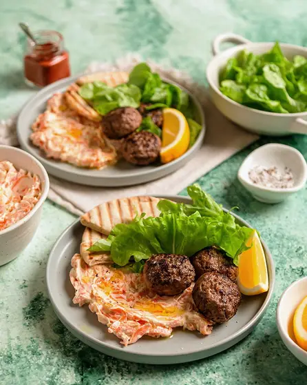 Carrot tzatziki with meatballs and toasted pita