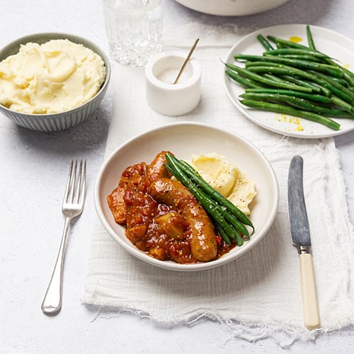 Slow cooker devilled sausages