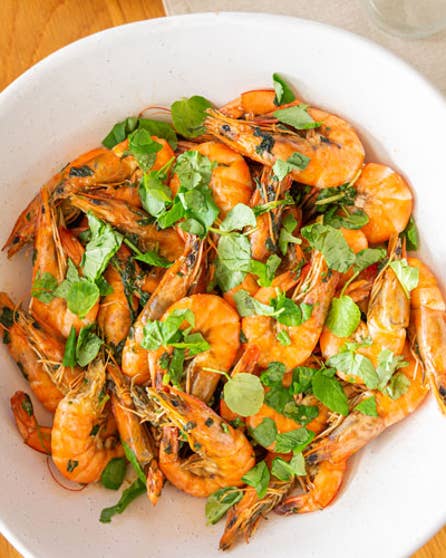 Whole prawns with garlic butter and watercress