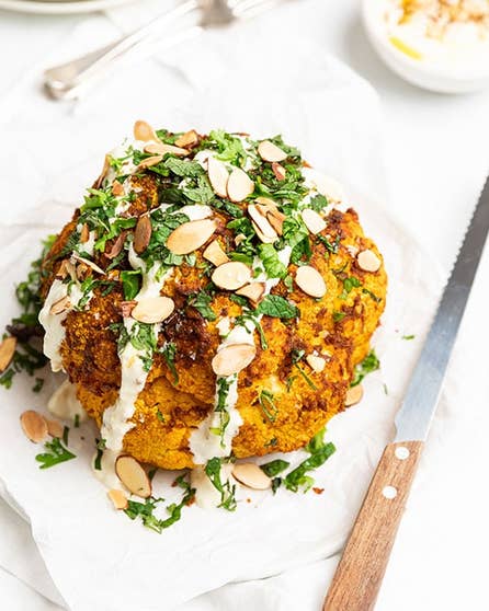 Whole roasted cauliflower with garlic yoghurt