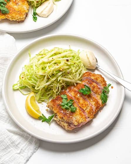 Parmesan pork schnitzel with apple slaw