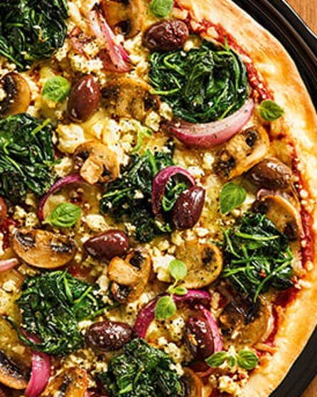 Spinach, olive and feta pizza