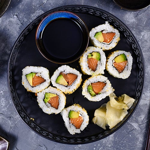 Fresh salmon avocado sushi