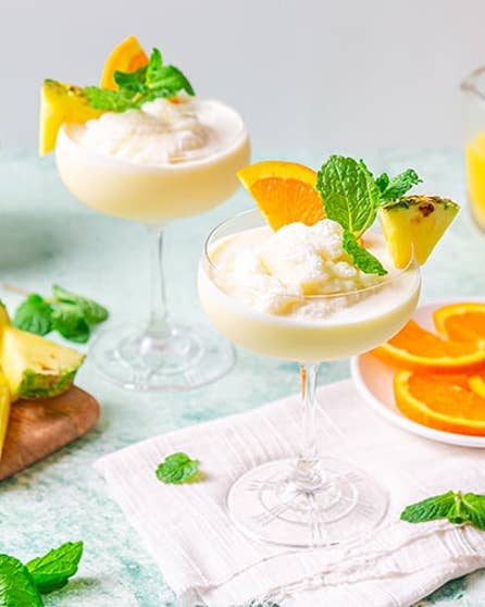 Icy pineapple and orange mocktails