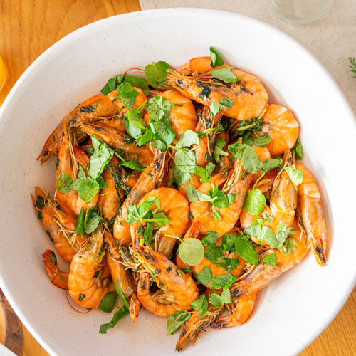 Whole prawns with garlic butter and watercress