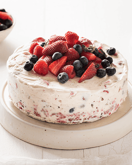 Chocolate cookie and berry ice cream cake