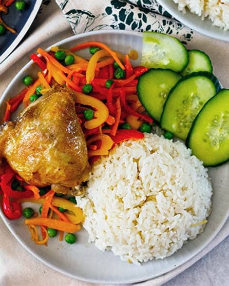 Chicken rice and stir-fried vegetables
