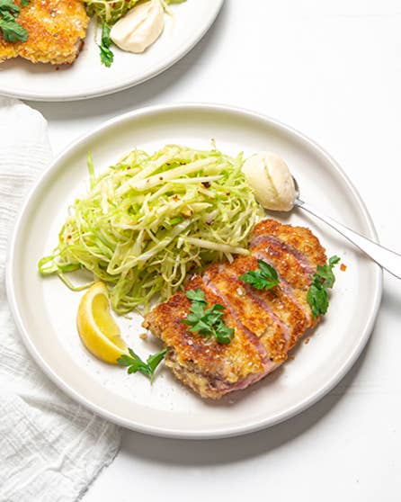 Parmesan pork schnitzel with apple slaw
