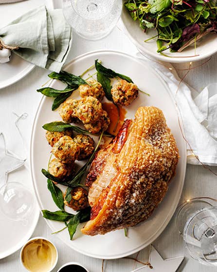 Roast pork leg with sage and apricot stuffing balls